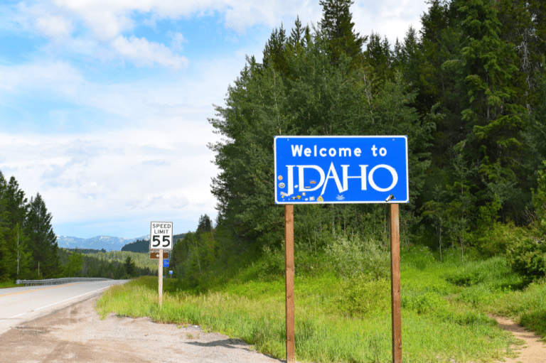 Roadside sign in Idaho greets travelers to experience Idaho Natural Attractions.